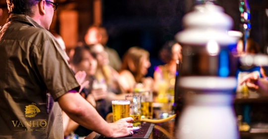 people drinking at a bar